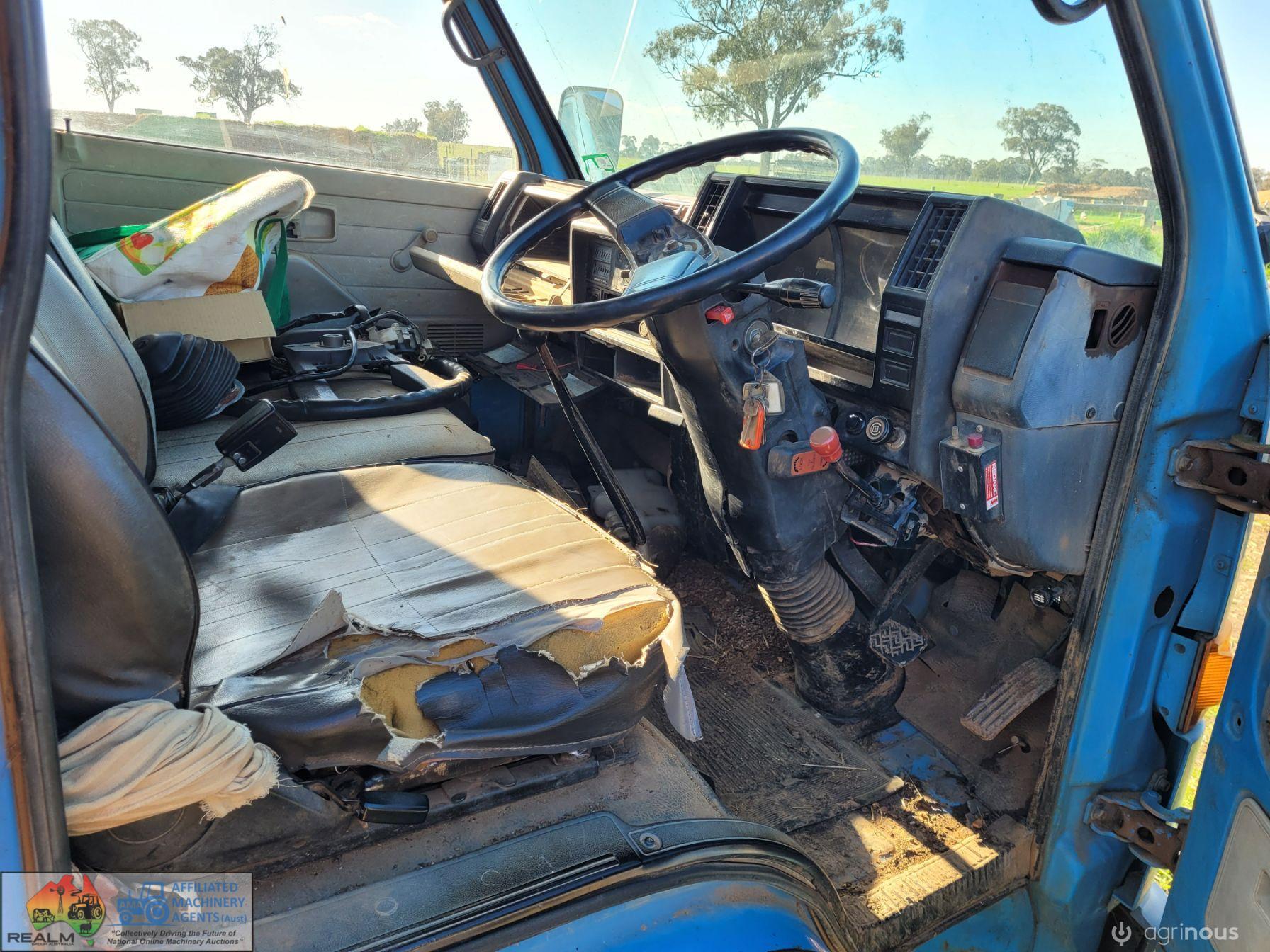 1987 Isuzu Elf 250 Tip Truck - photo 7
