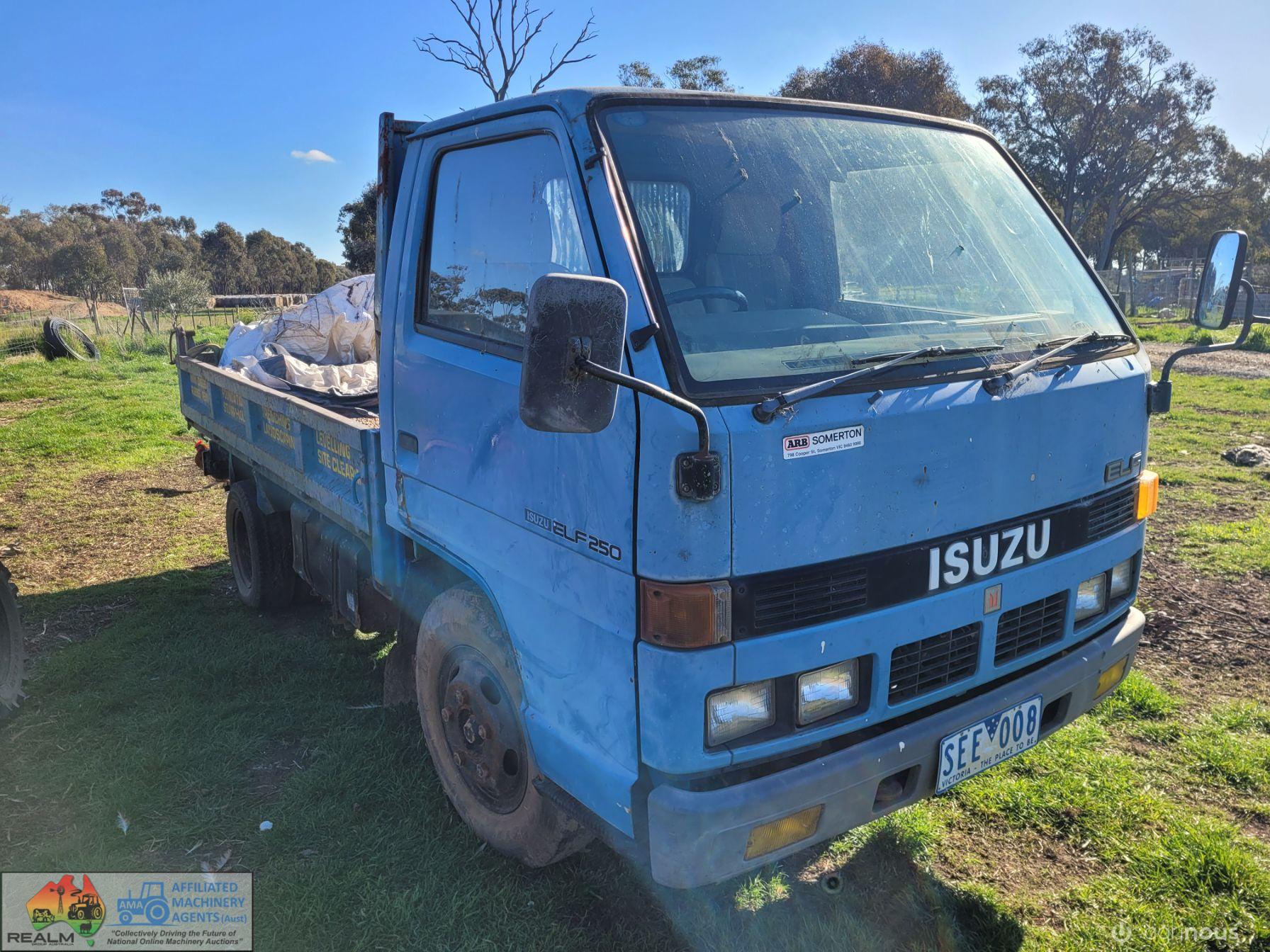 1987 Isuzu Elf 250 Tip Truck - photo 2