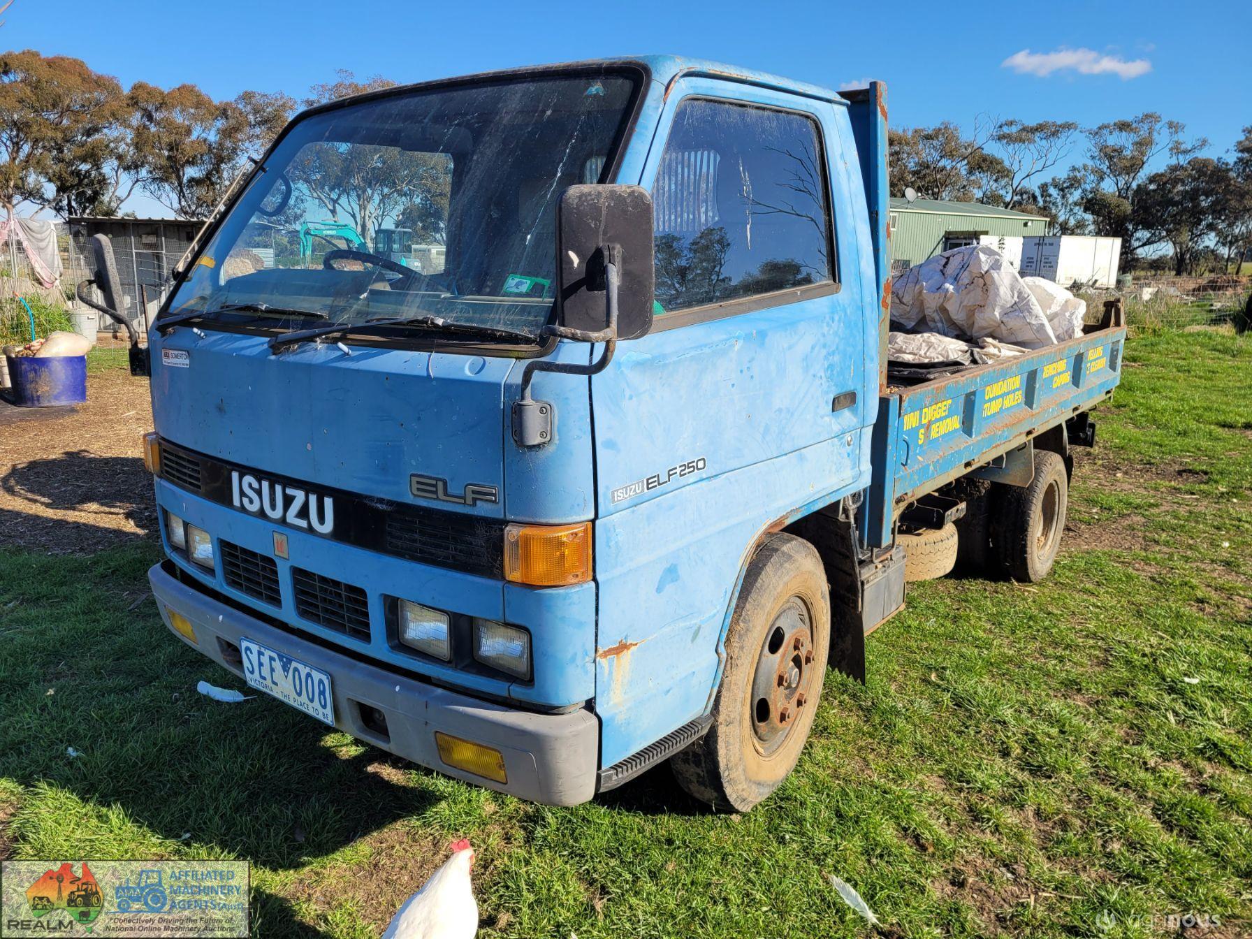 1987 Isuzu Elf 250 Tip Truck - photo 3