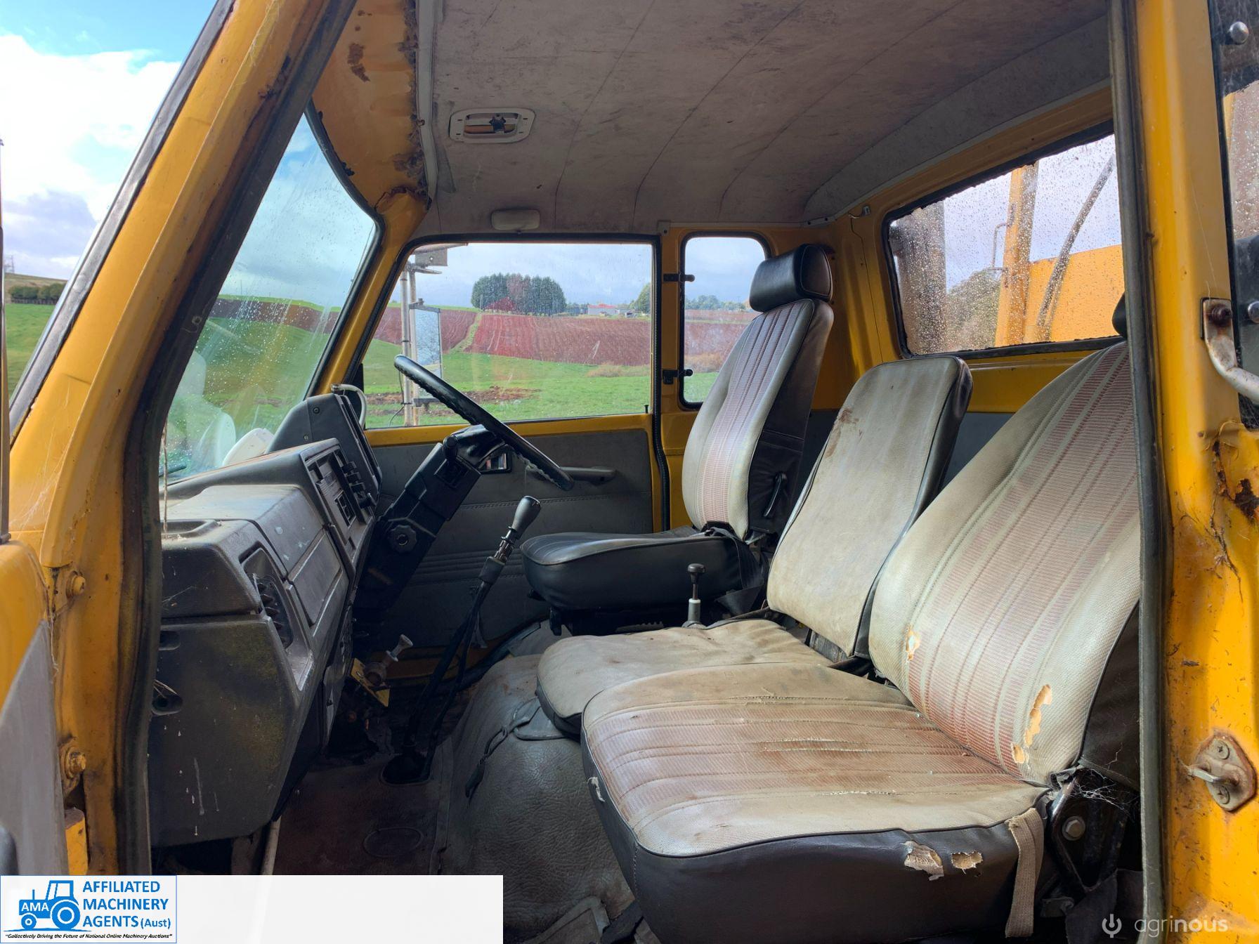 Isuzu Tip Truck - photo 18