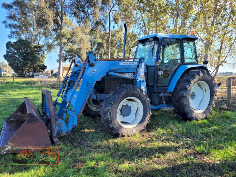 1996 New Holland 7840 with Challenger FEL