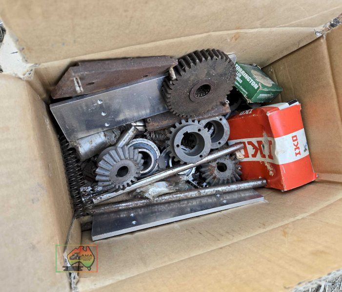 Box of assorted pulleys, right angled gears, fine rollers, and bearings etc. (#212)