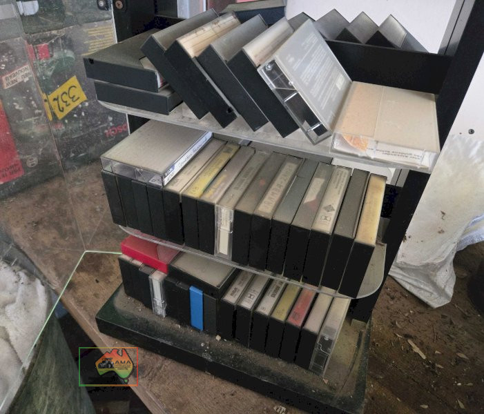 Assorted Music Cassette Tapes in Storage Cabinet - photo 2