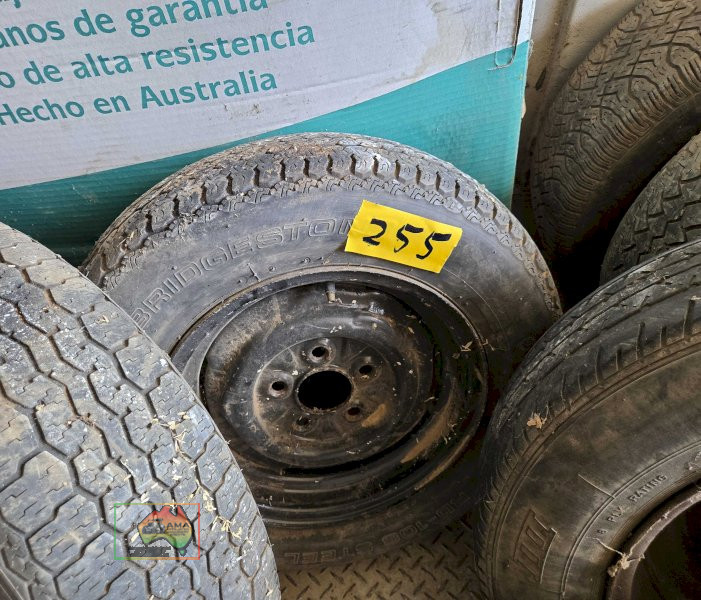 Assorted trailer rims and tyres