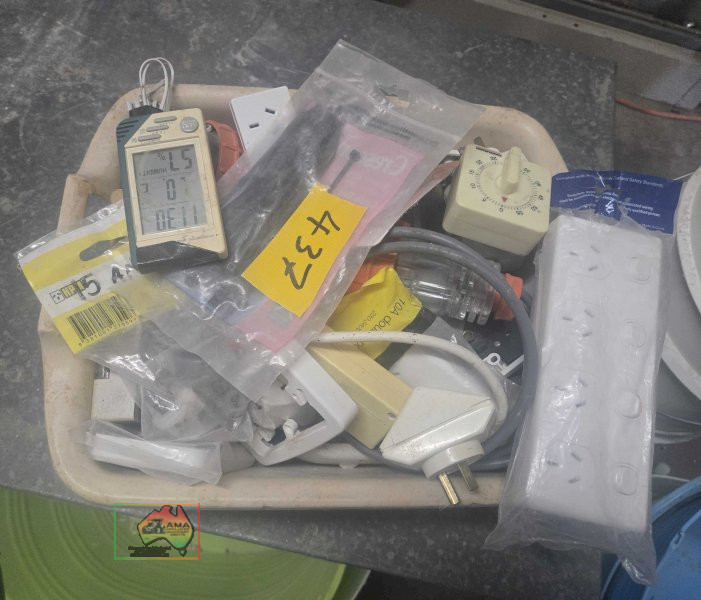 Carry tub of assorted electric plugs, power points etc..