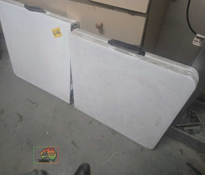 2 fold up trestle tables