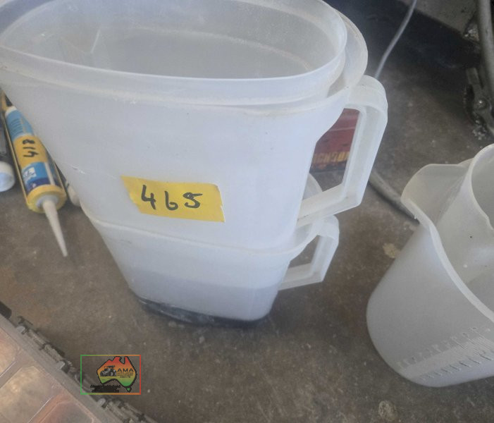 Assorted plastic measuring cups and jugs