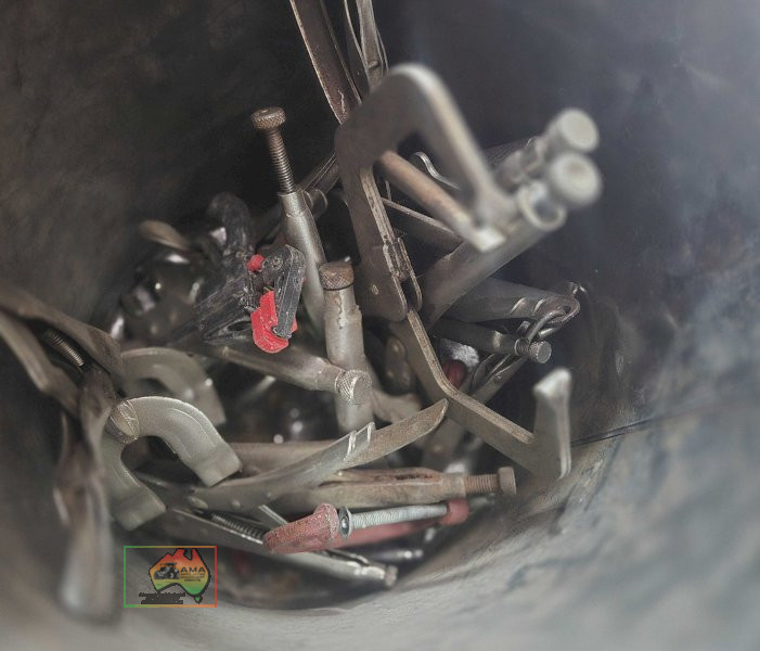 Bucket of assorted vice grips, clamps etc.