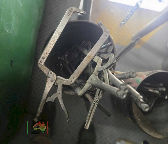 Bucket of metal spring clamps - photo 2