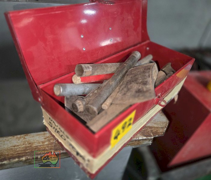 Toolbox of assorted steel rod, punches, axe head etc.