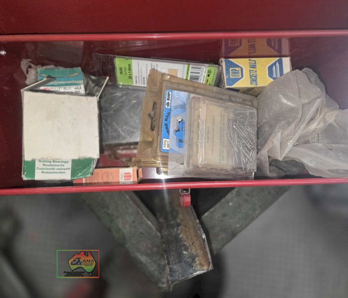 Toolbox of assorted nails and screws
