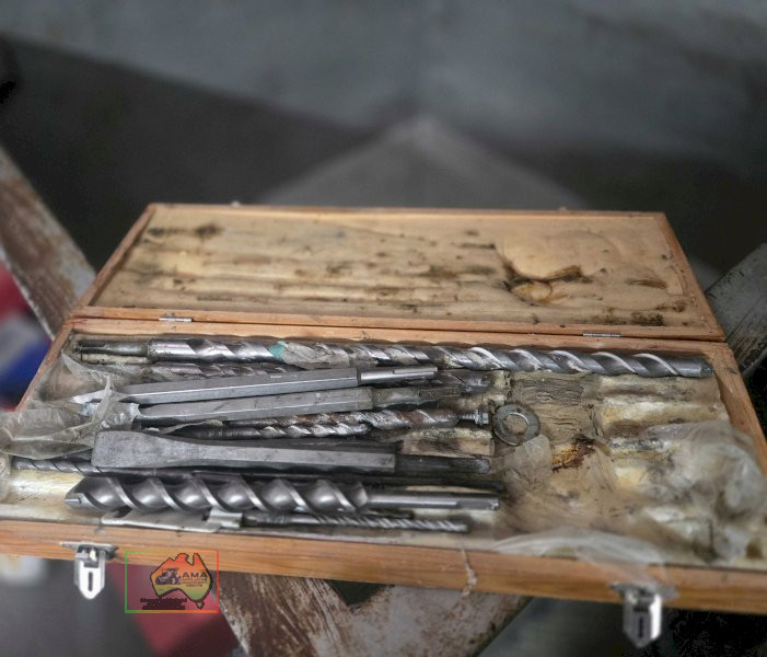 Wooden toolbox of assorted masonry drill bits - photo 2