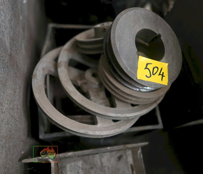 Tub of assorted small pulleys
