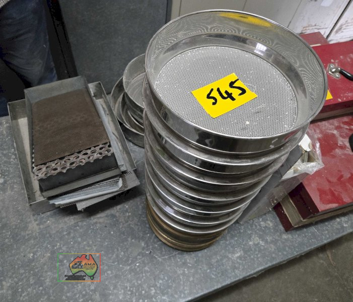 Assorted stainless steel sieve trays