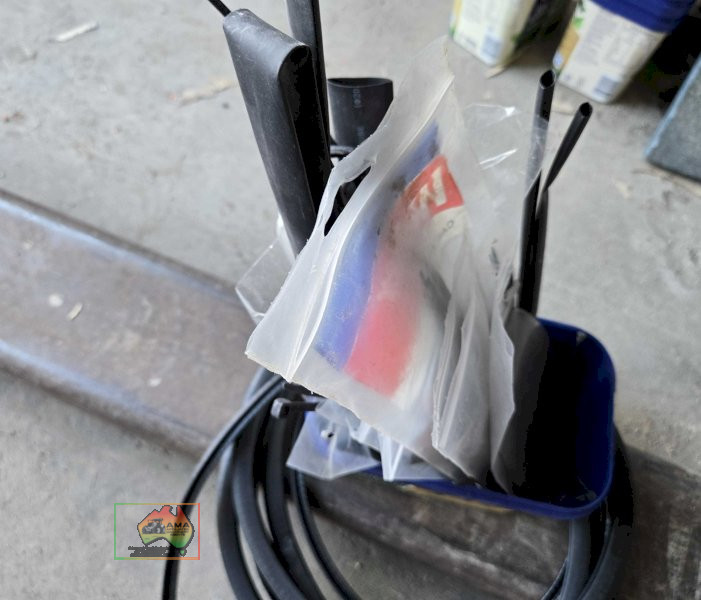 Assortment of heat shrink wrapping, zip ties and sharp edging rubber