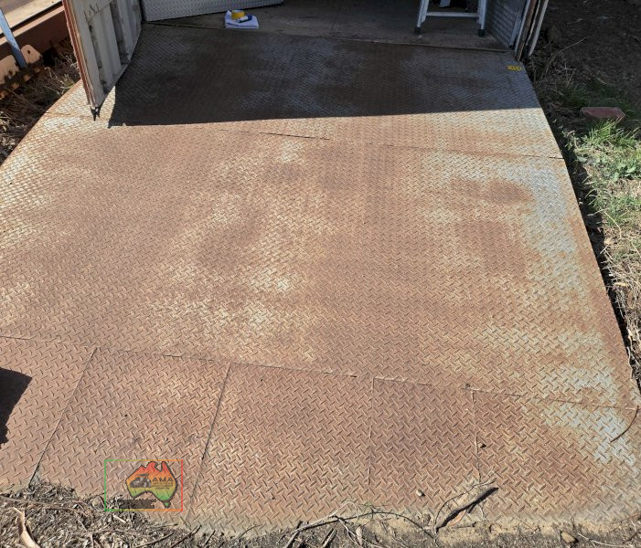 Steel checker plate entry ramp for Shipping Container.
