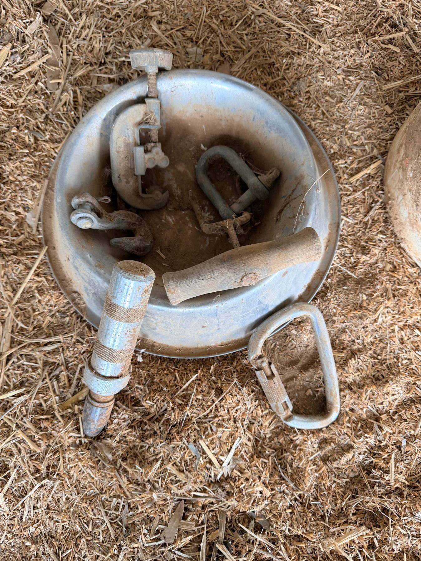 Small bucket of assorted tools and dog bowl - photo 1