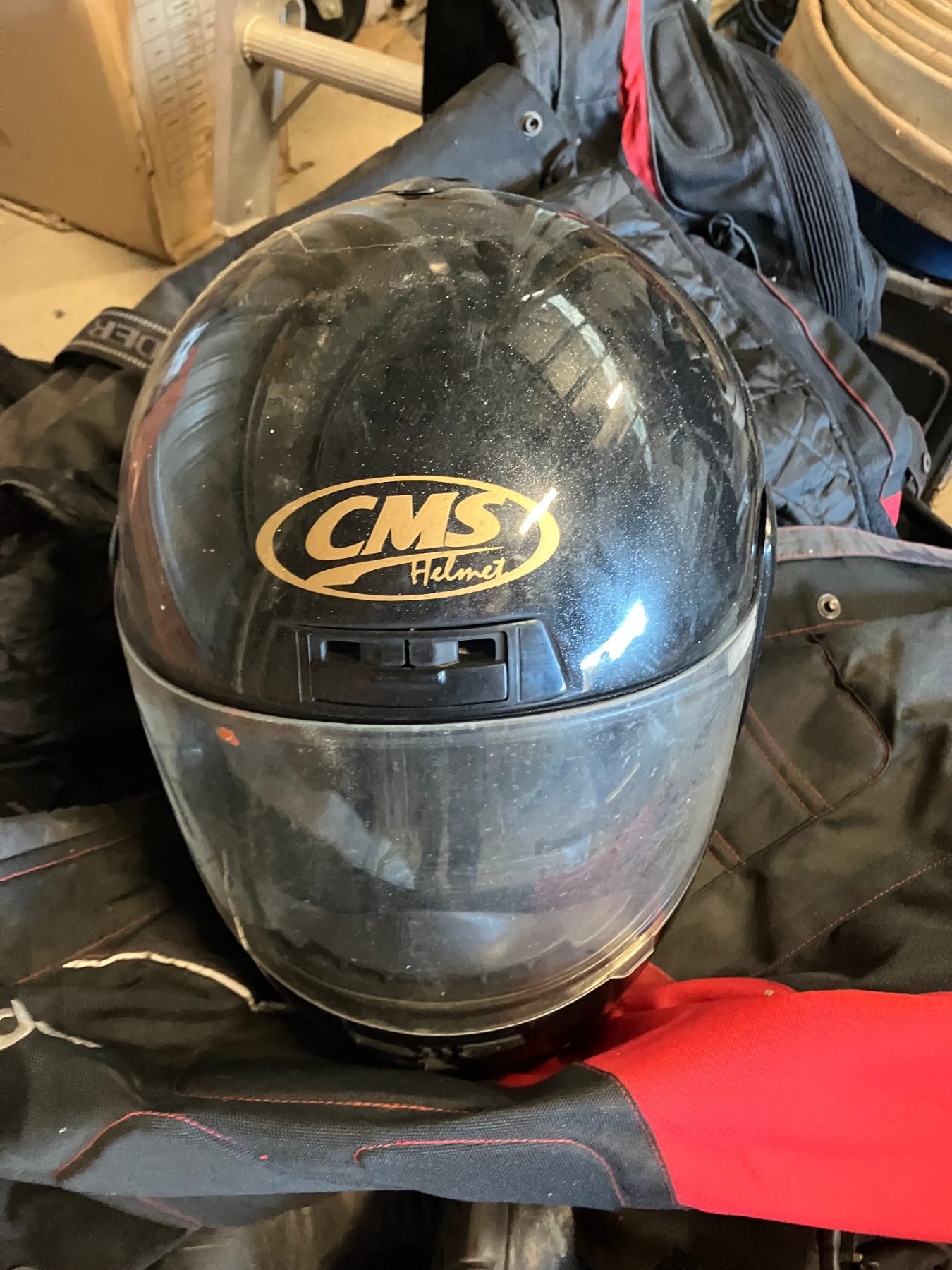 Assorted motorcycle jackets and accessories