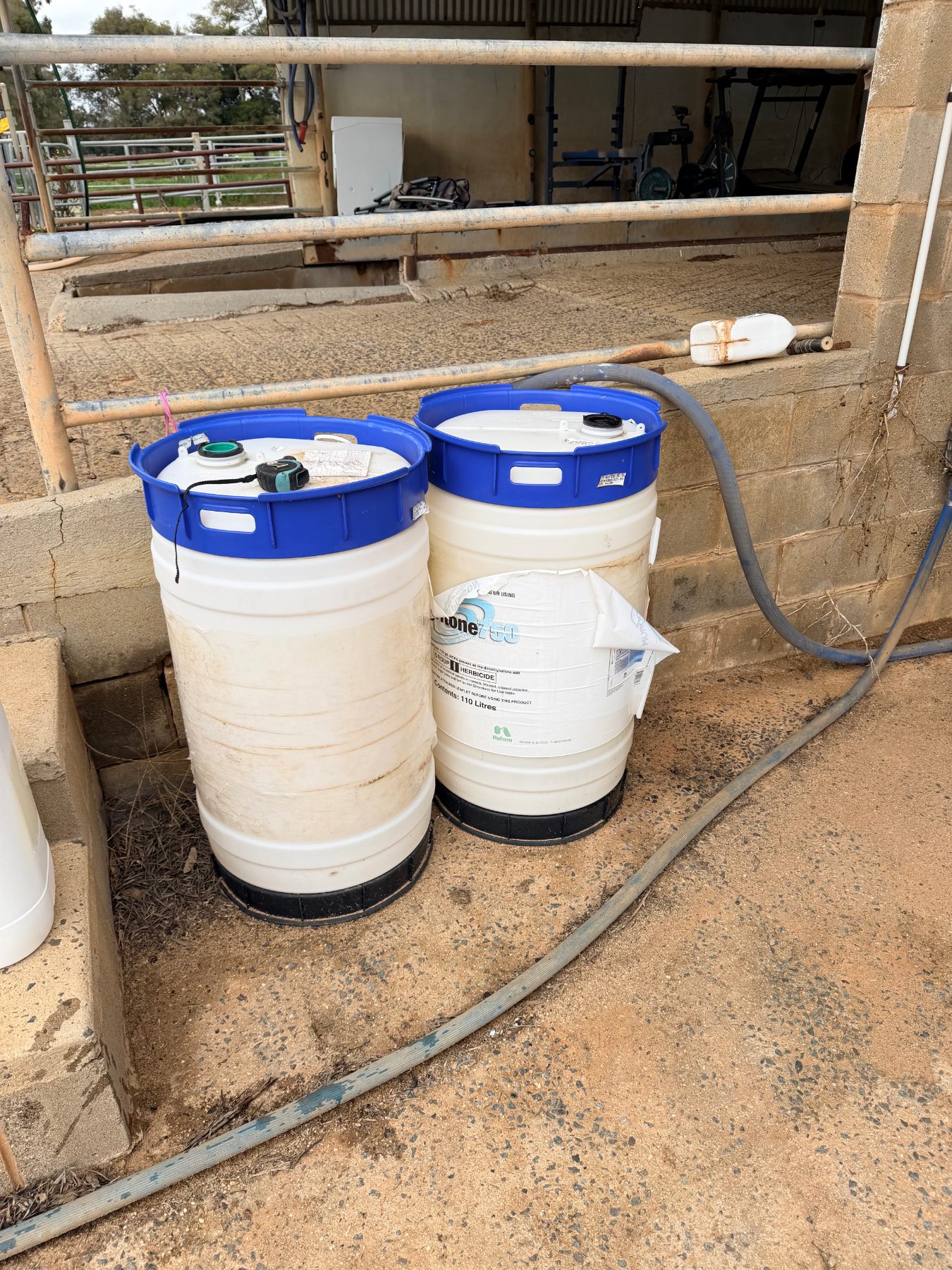 2 of 110L chemical storage drums (empty)