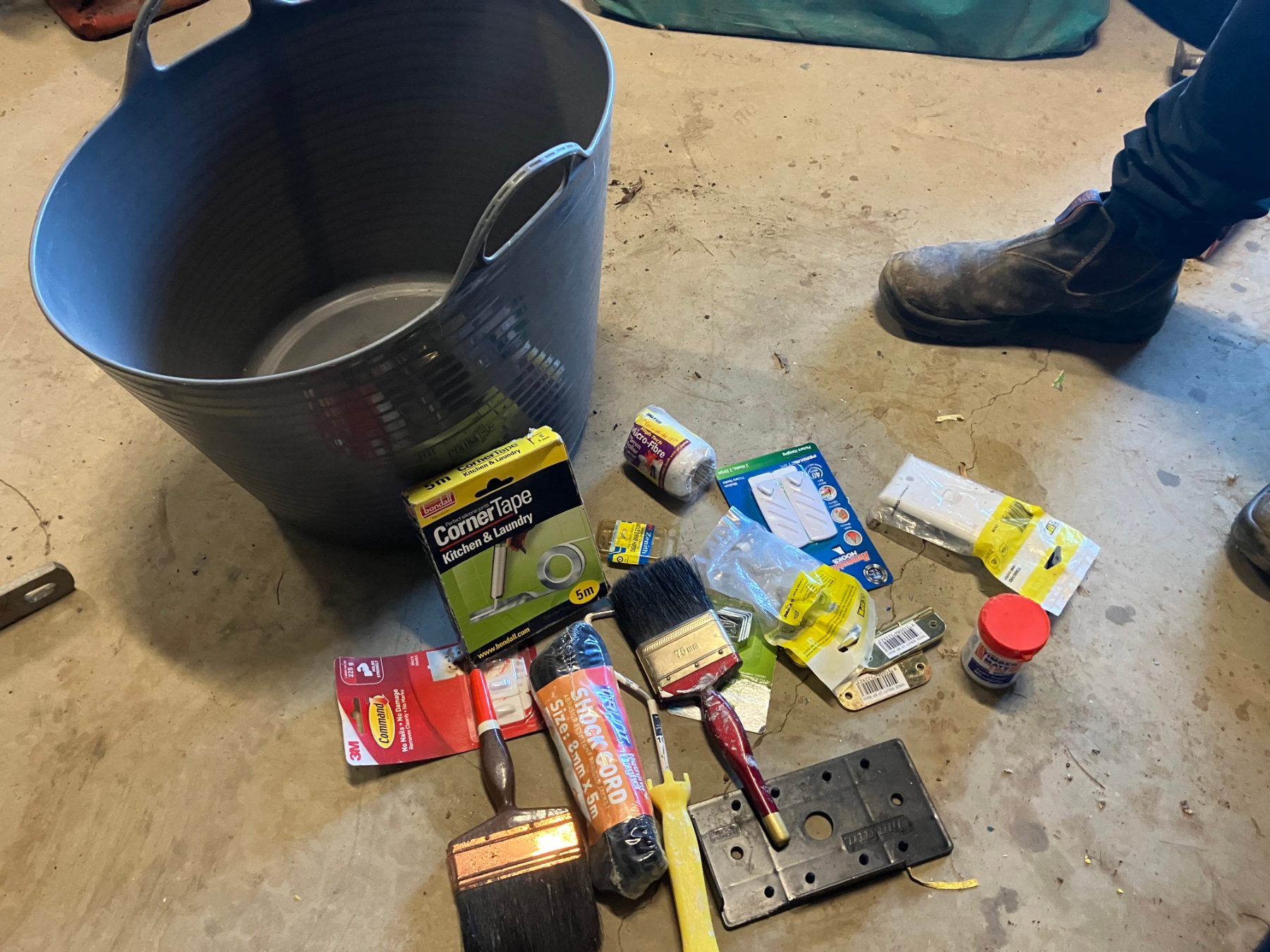 Storage tub of paint brushes and renovation consumables
