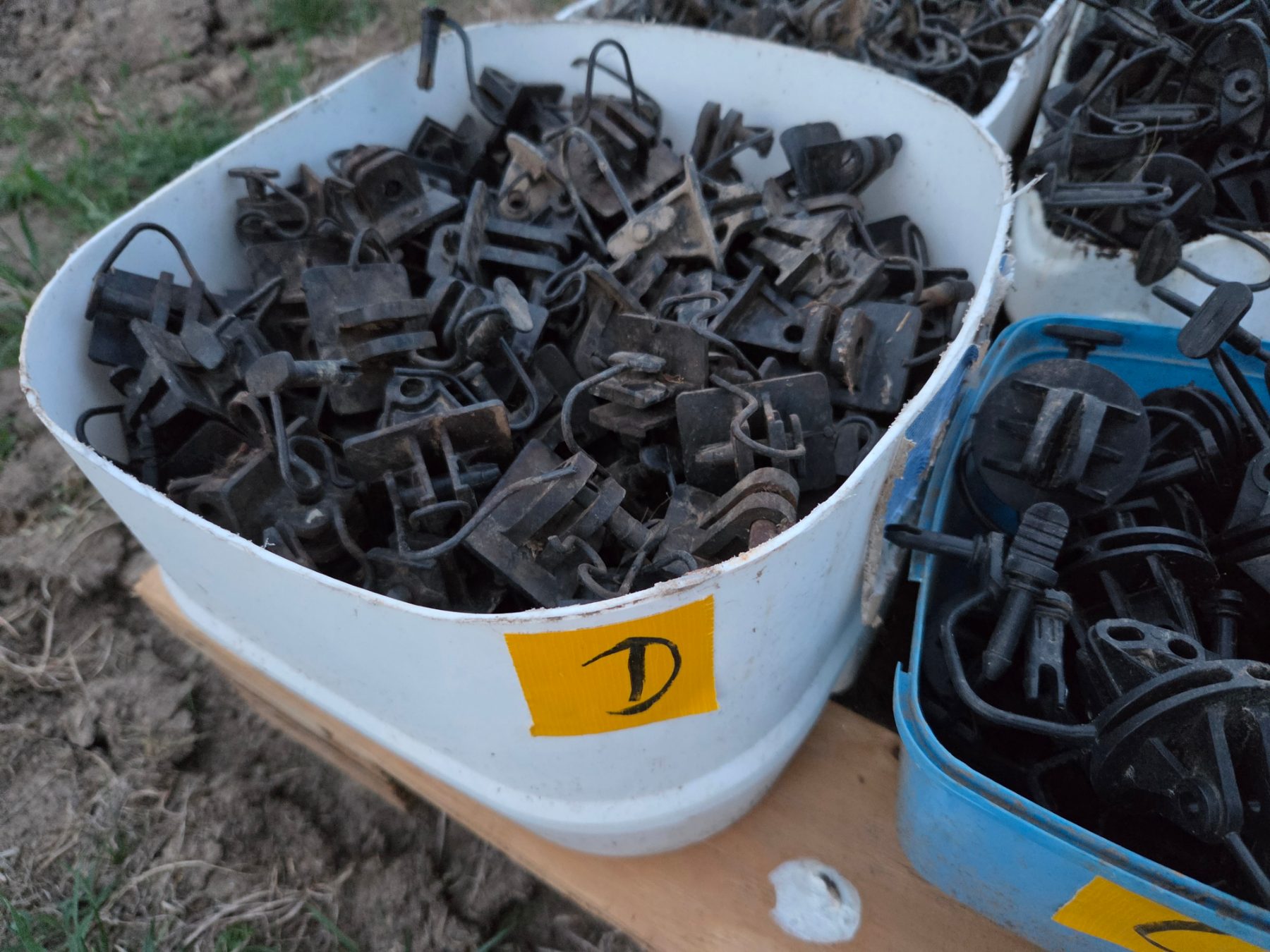 Used - Bucket (D) of Electric Fence Insulators - photo 1