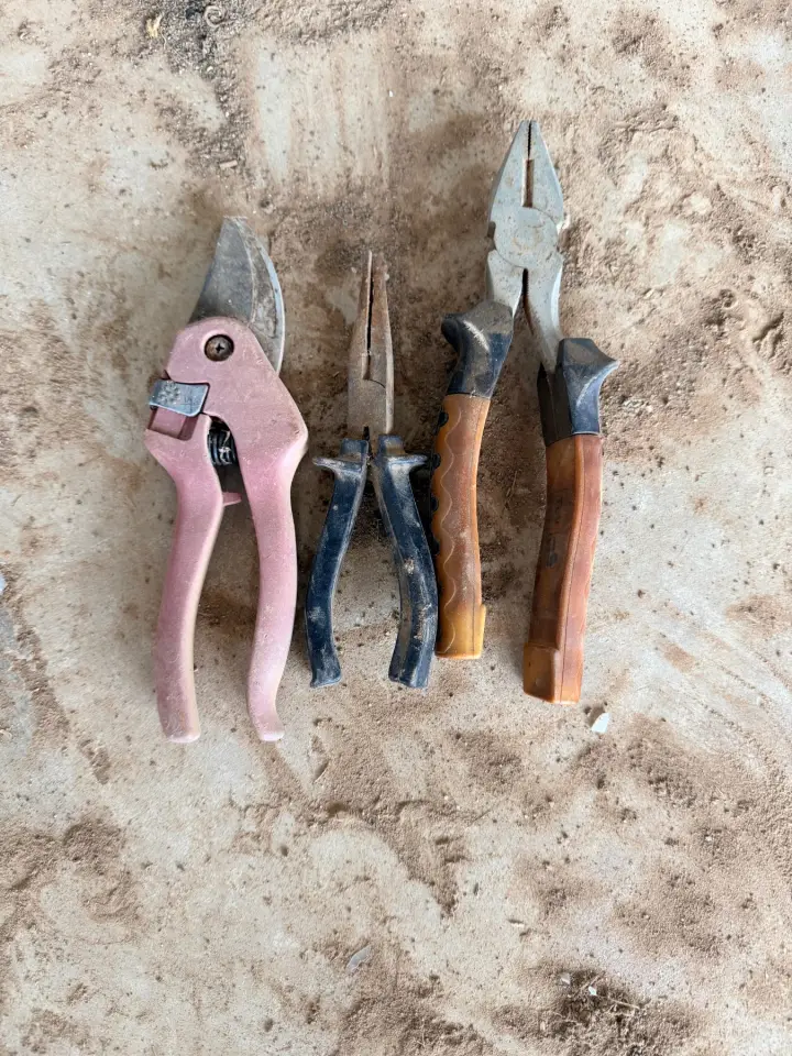 2 sets of pliers and 1 set of pruning sheers