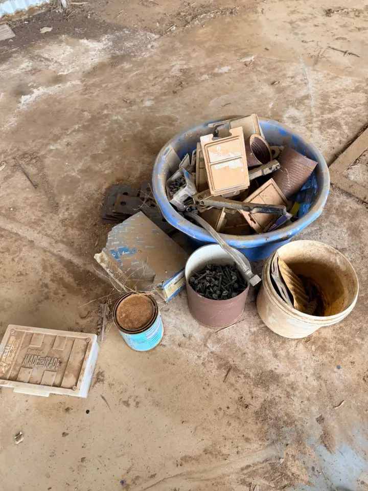 Tub full of assorted nuts, bolts, screws, rivets etc.