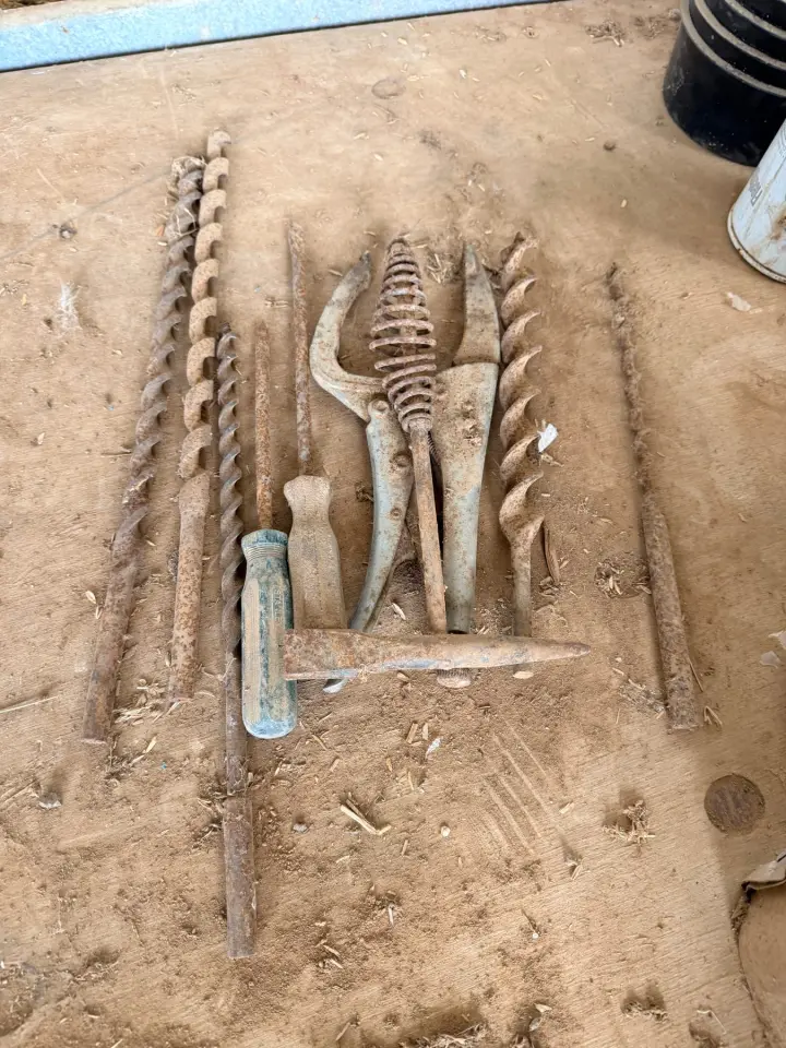 Assorted drill bits, tools, and chipping hammer