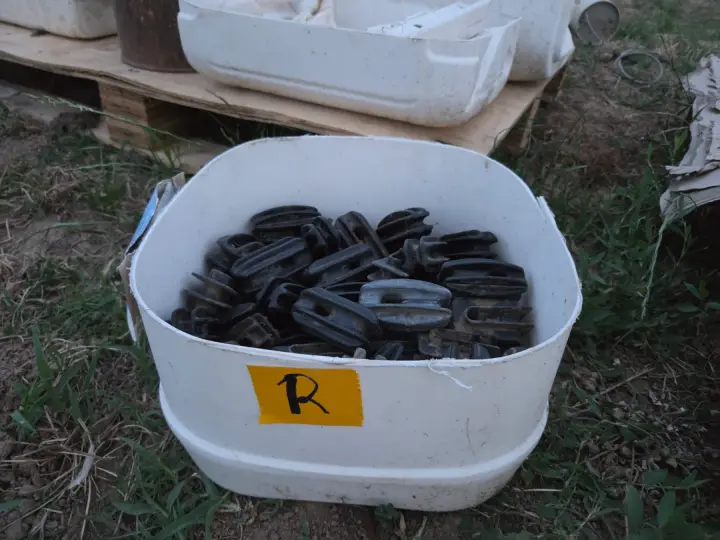 Used - Bucket (R) of Electric Fence Insulators
