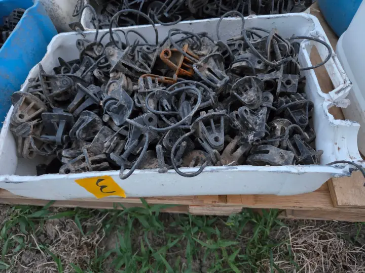 Used - Bucket (E) of Electric Fence Insulators