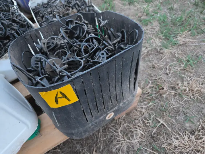 Used - Bucket (A) of Electric Fence Insulators