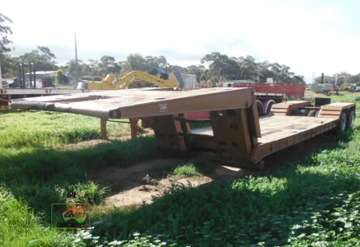 Drop front low loader