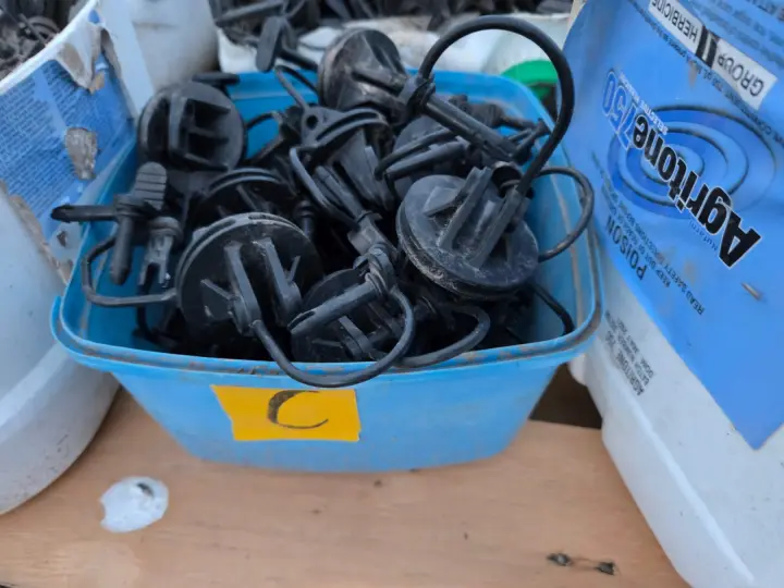 Used - Bucket (C) of Electric Fence Insulators