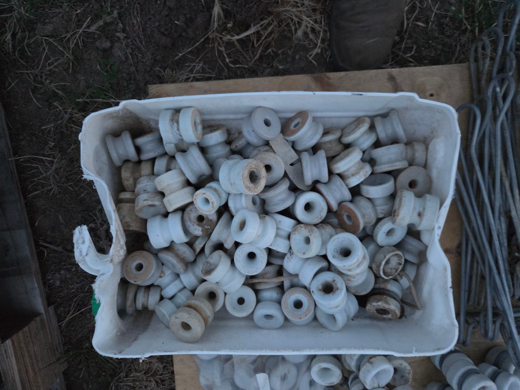 Used - Tub of Elec. Fence Porcelain Insulators - photo 1
