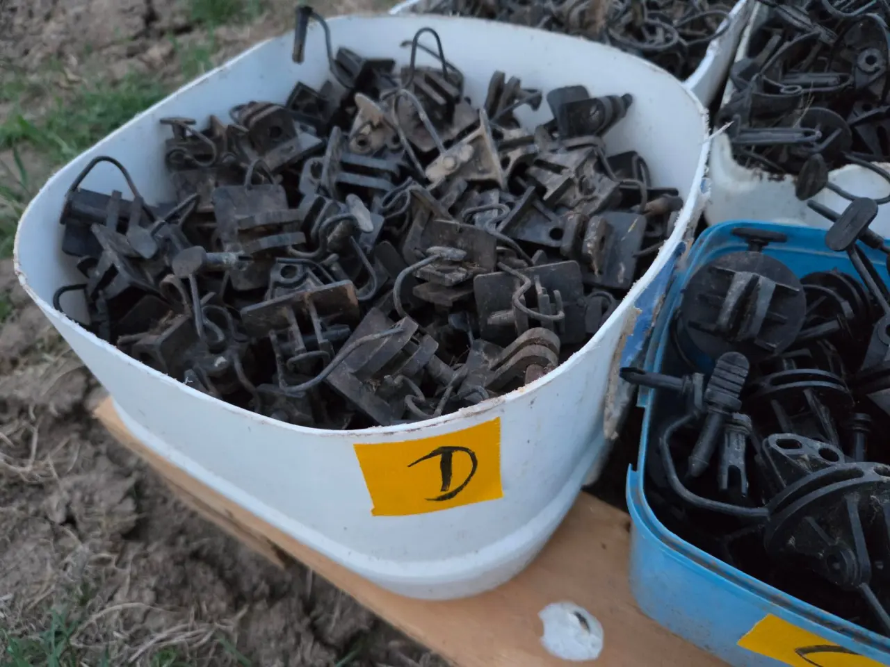 Used - Bucket (D) of Electric Fence Insulators - photo 1