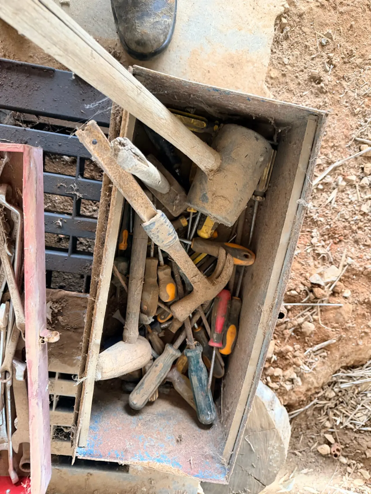 Old toolbox full of assorted hammers, mallets, and screwdrivers - photo 1