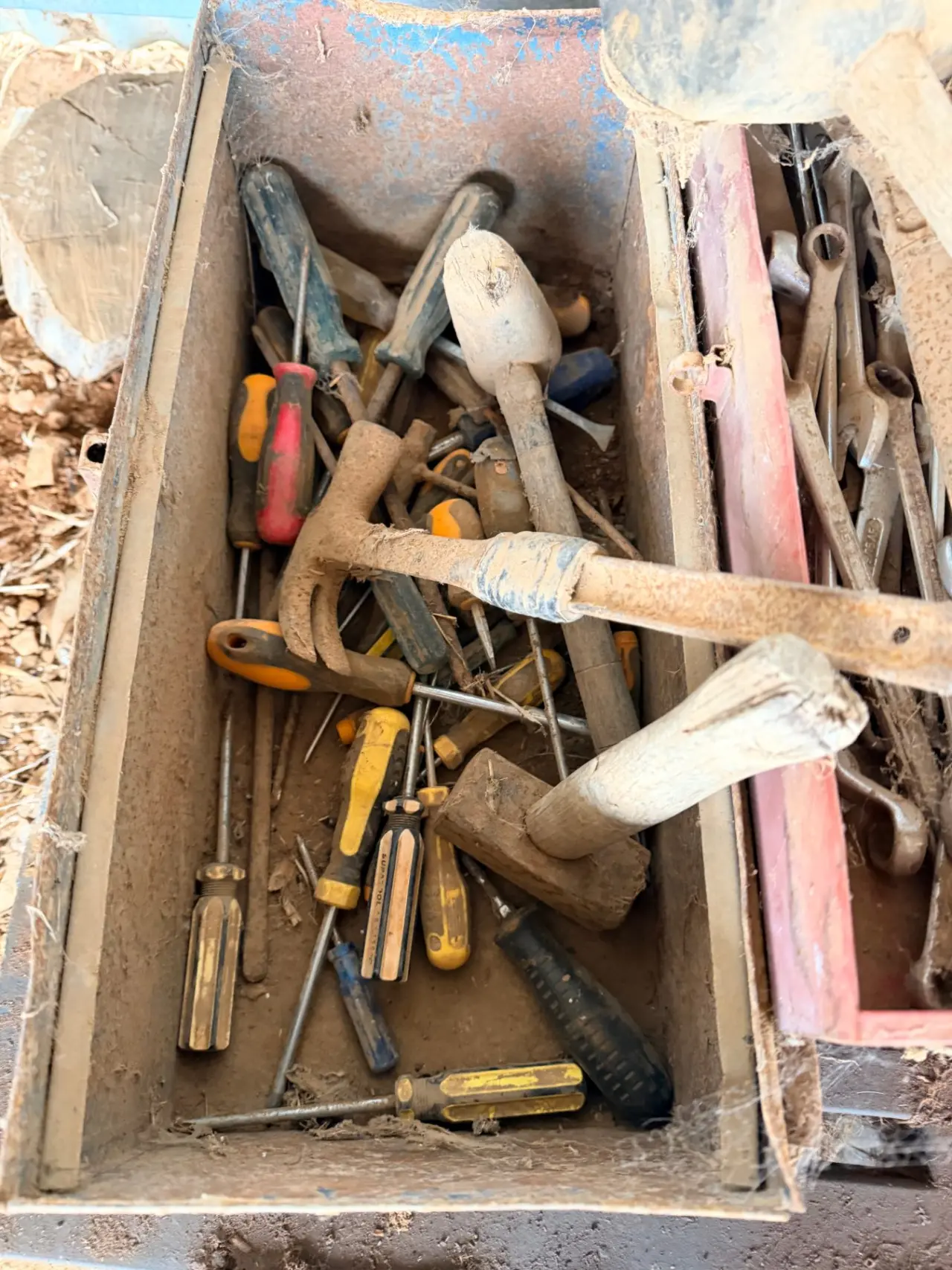 Old toolbox full of assorted hammers, mallets, and screwdrivers - photo 2