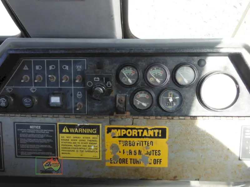 Cat 428B backhoe - photo 11