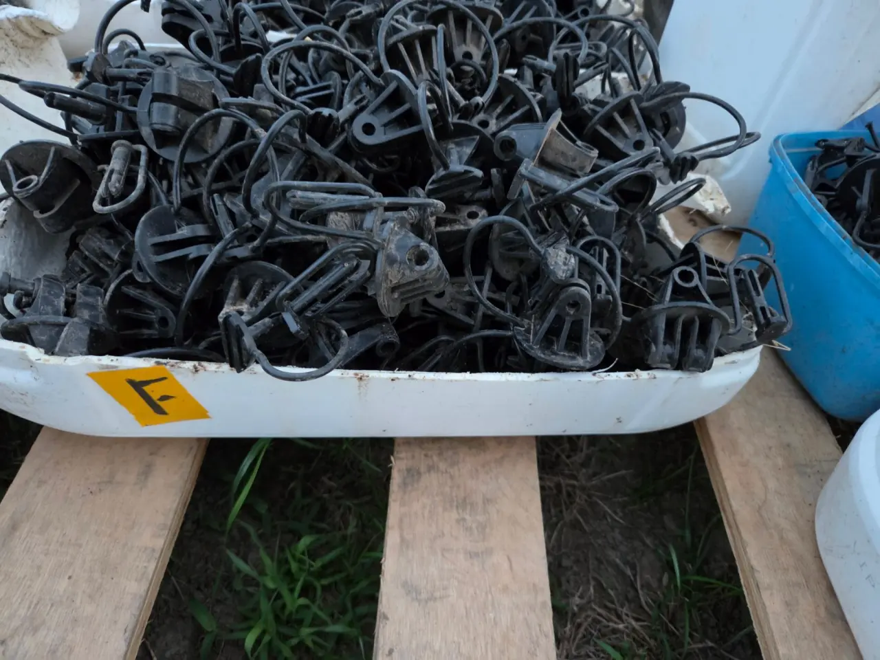 Used - Bucket (F) of Electric Fence Insulators - photo 1