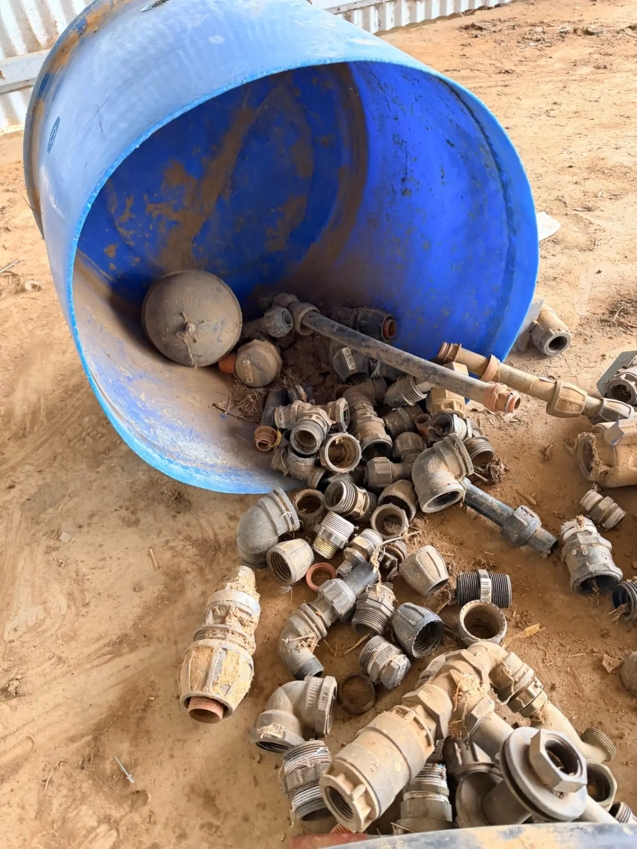 Storage tub of assorted irrigation fittings and valves - photo 3