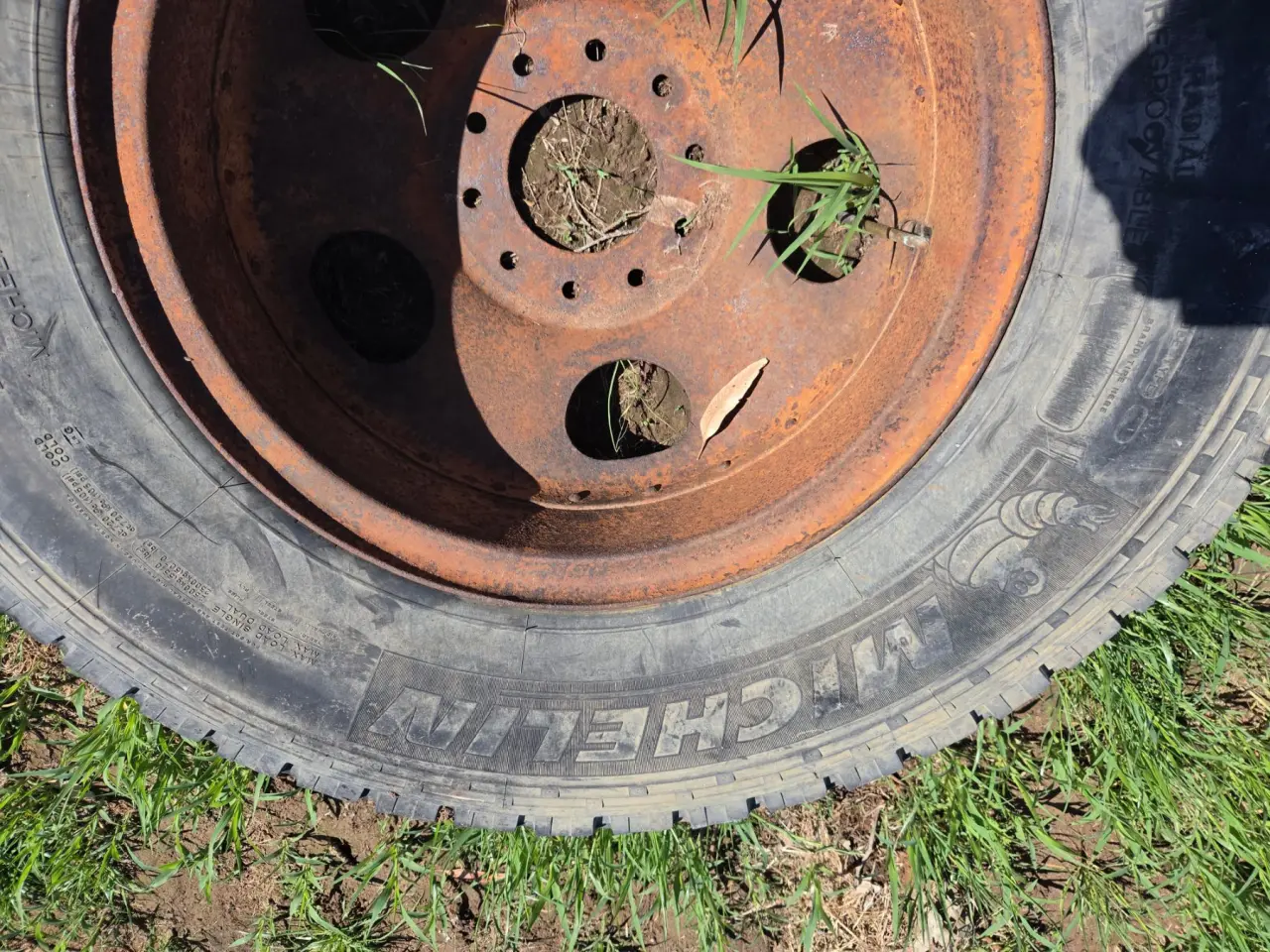 Used - 10 Stud Truck Rim with Good Michelin 9.00R20 - photo 1