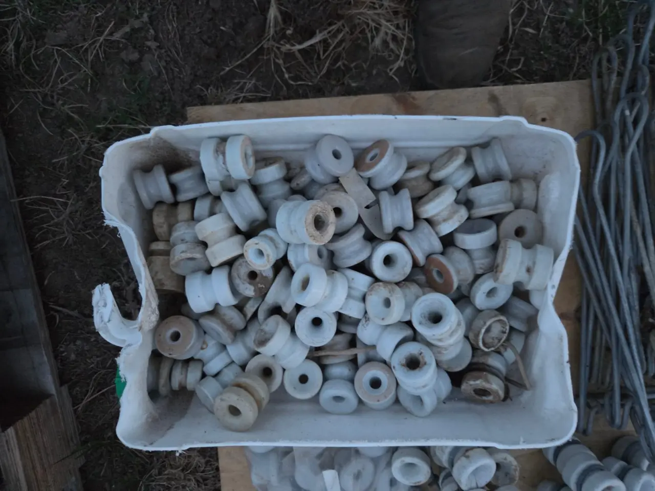 Used - Tub of Elec. Fence Porcelain Insulators - photo 1