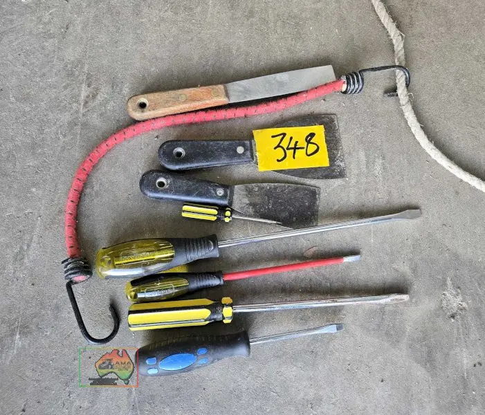 Assorted screw drivers, jockey strap, & paint scrapers - photo 1