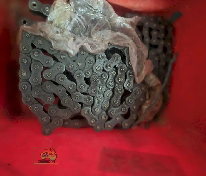 Bucket with assorted sprocket/gear chains - photo 2