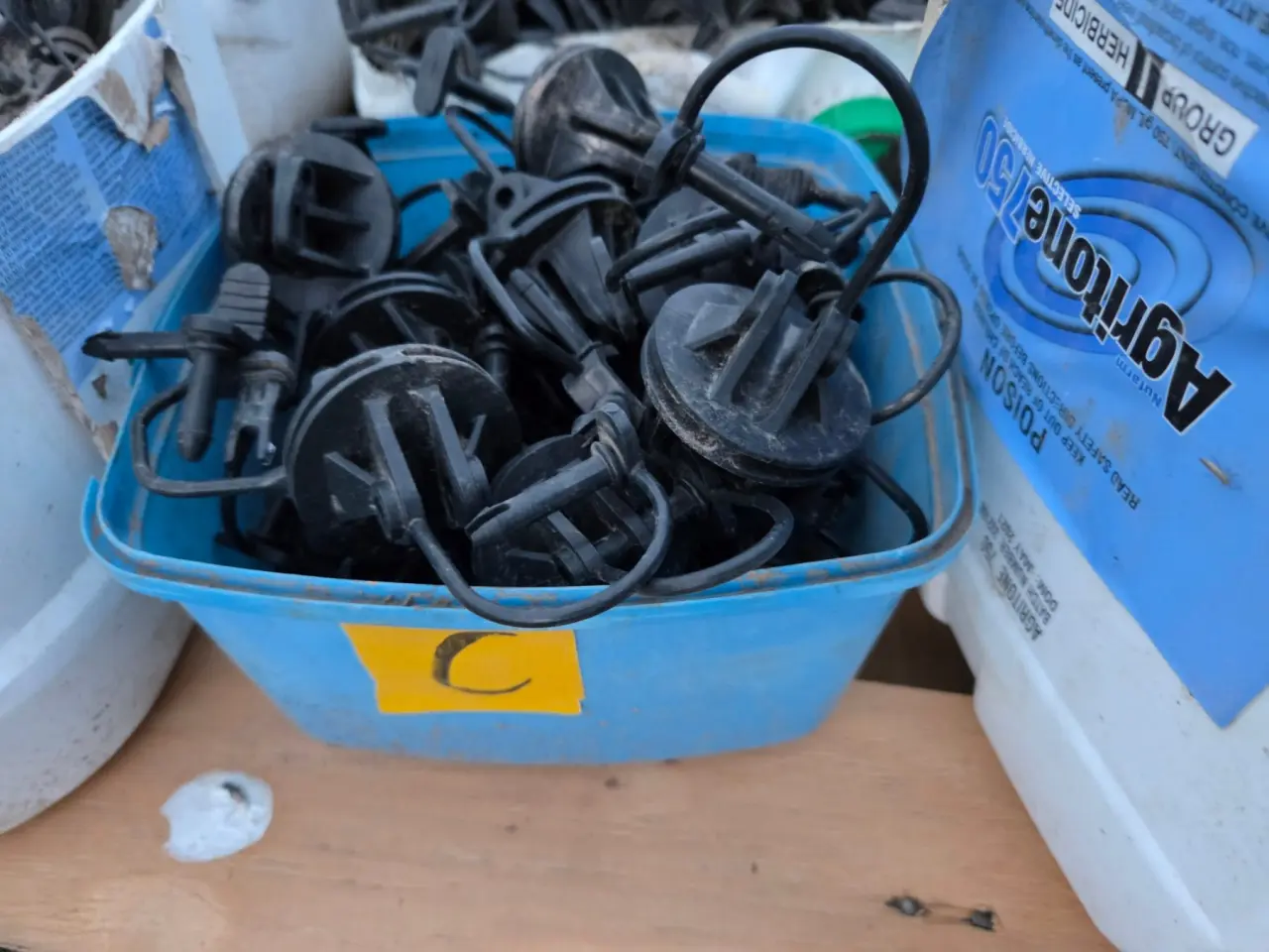Used - Bucket (C) of Electric Fence Insulators - photo 1